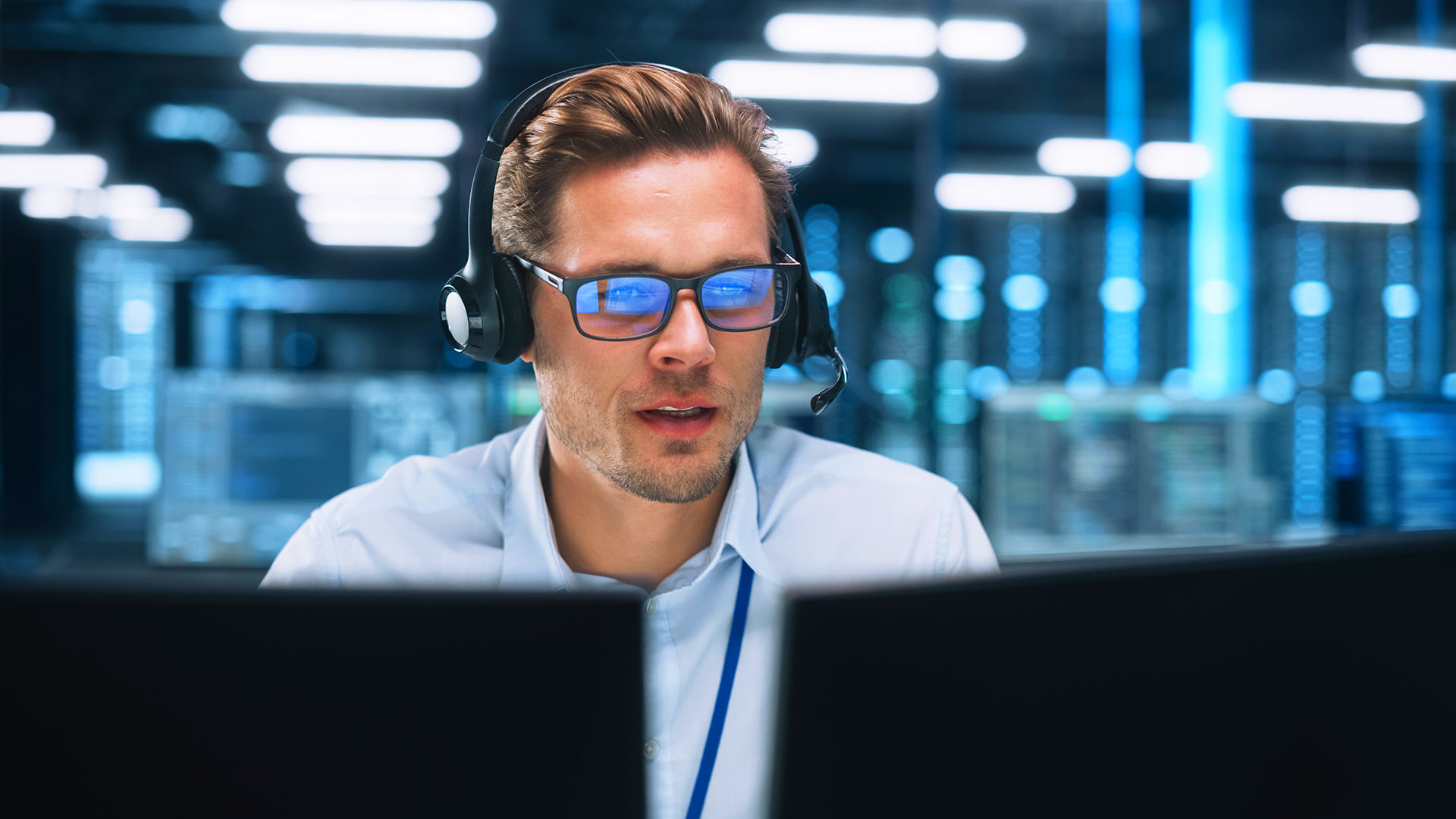 Headset technician monitoring systems in server room